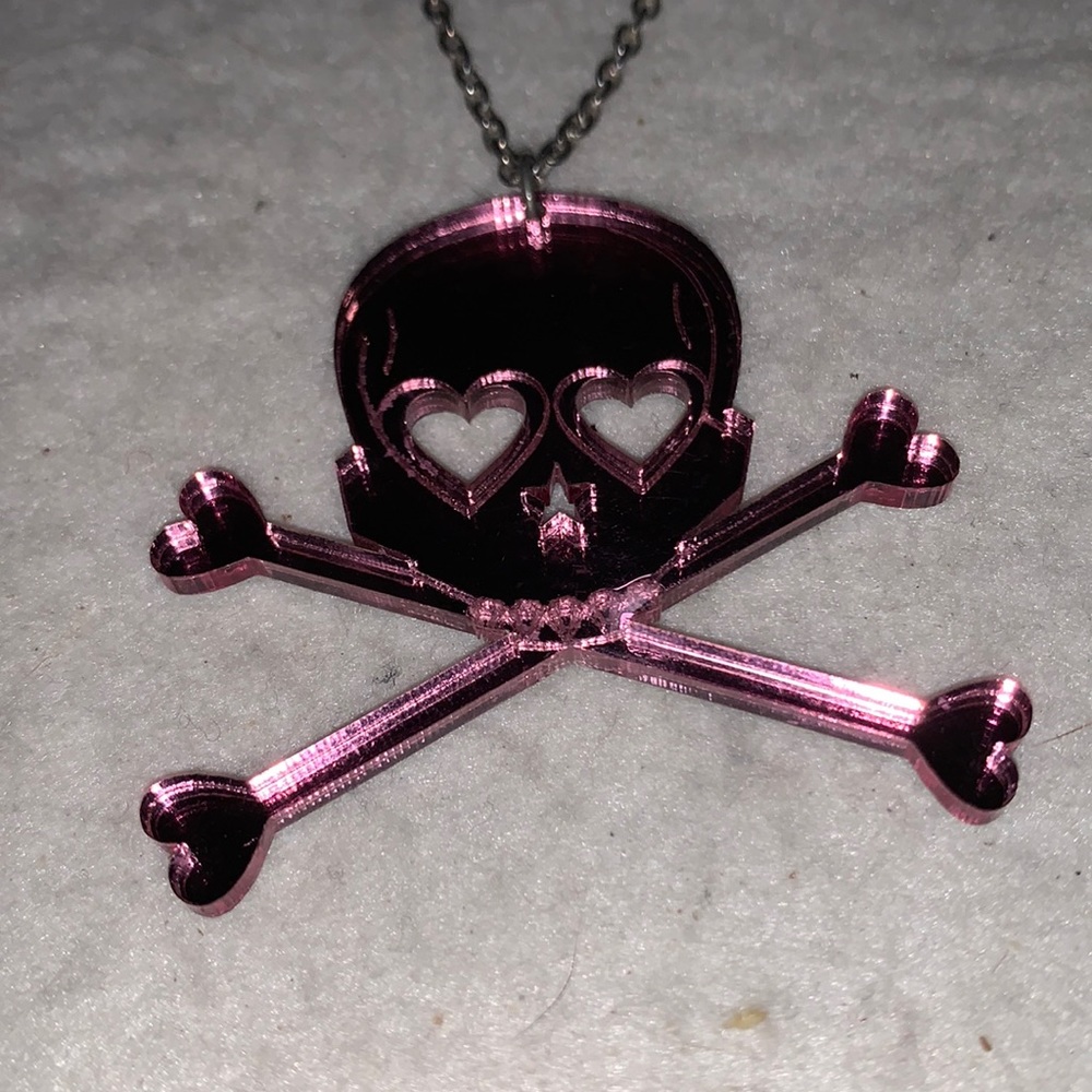 Signed Emma Brite Pink on one side Gray on the other Skeleton with Cross Bones